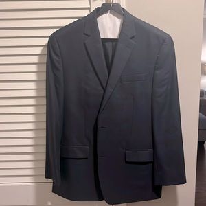 Men’s Sport Coat. Navy blue with some light faded blue patterning.